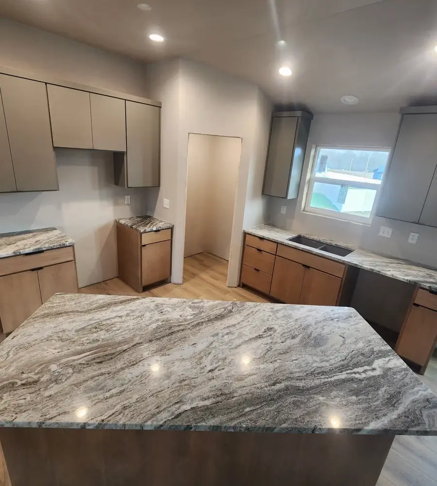 Granite island and perimeter countertops fabricated by Counterstone